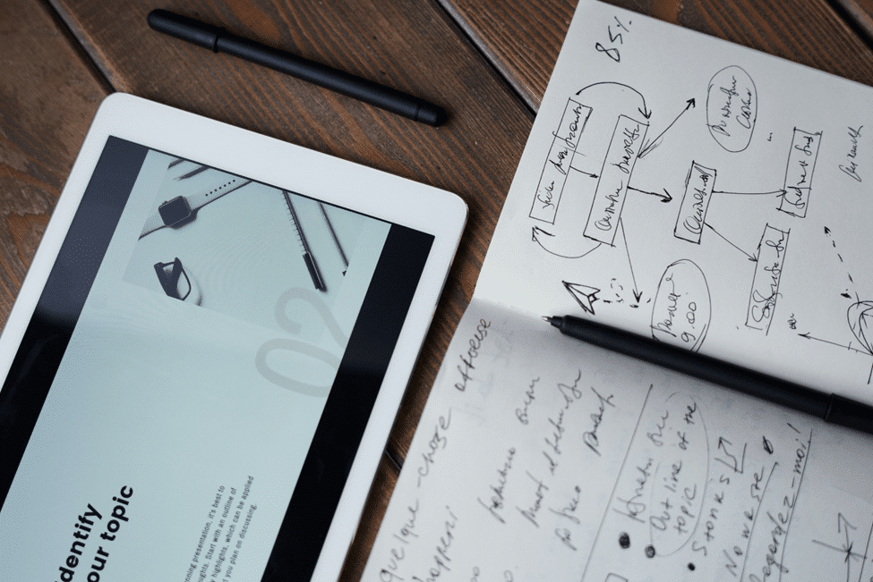 iPad and paper with notes