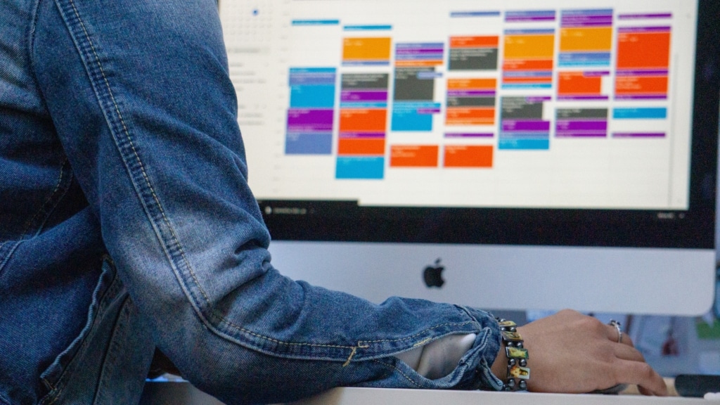 Person accessing their online calendar